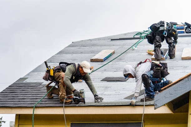 Professional Flat Roof Repair technician working in Long Beach, MS